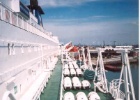 sideofship1  The white cylinders in the photo on the left contain 25 people emergency liferafts.