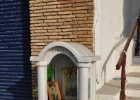 DSC 3923  A little random shrine outside someone's home. We saw a few of these.  Naxos